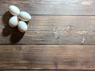 White chicken eggs. Eggs background. Chicken egg close-up.