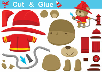 Little bear cartoon wearing firefighter uniform while spray water from hydrant. Education paper game for children. Cutout and gluing