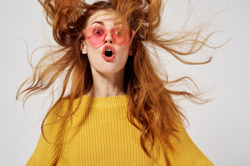 Fototapeta premium beautiful woman in a sweater and glasses hairstyle fashion glasses