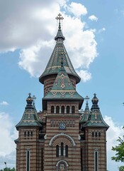 Fototapeta na wymiar Characteristic towers of the metropolitan cathedral of Timisoara, western Romania