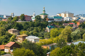 Vladimir city in Russia panoramic view. Authentic historical buildings, houses and churches in summer sunny day among green trees