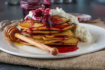 Spelt pancakes with russian  jam, honey and cottage cheese