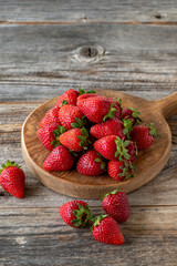 fresh strawberries on wood background