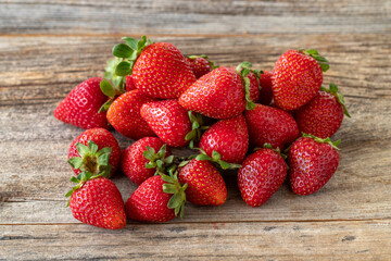 fresh strawberries on wood background. Ckıse up