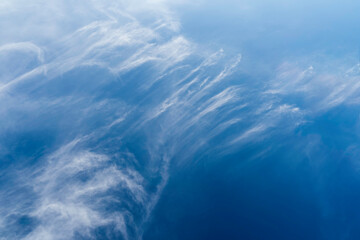 Fototapeta na wymiar Beautiflu white wave clouds in blue sky, Freedom and nature concept.