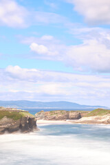 Fototapeta premium Os Castros beach at high tide in Galicia, Spain