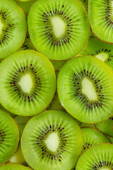 Kiwi Macro,slice of kiwi fruit on a full frame. horizont 