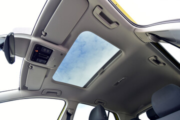 A window on the roof of a passenger car