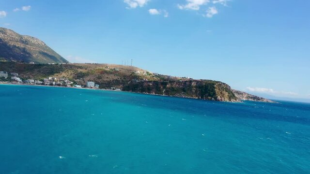 Birdseye view of Himara Beach and Adriatic Sea. Beautiful water Albania Riviera