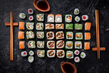 Sushi set isolated on black background. Photo for the menu and site. Top view. High quality photo