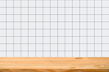 Empty wooden table over square ceramic tile background. Can used for display or montage your products.Mock up for display of product