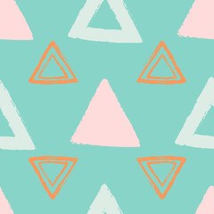 Vector Pastel Orange Blue Pink Triangles seamless pattern background perfect for fabric, scrapbooking, wallpaper, web and graphic projects.
