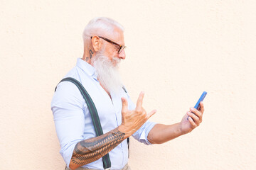 Senior man with a phone