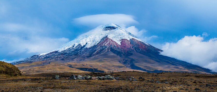 "The Giant" Cotopaxi volcano with a lenticular cloud in Ecuador. High mountains landscape background. 