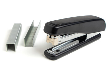 Black professional stapler isolated on white background