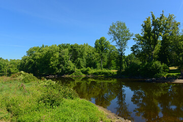 Fototapeta na wymiar Concord River in Minute Man National Historical Park, Concord, Massachusetts MA, USA.