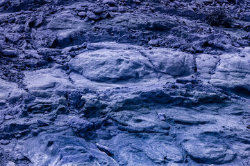 Abstract fantastic rocky landscape in blue tones