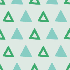 Vector Pastel Green Blue Triangles seamless pattern background perfect for fabric, scrapbooking, wallpaper, web and graphic projects.