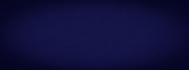 Dark blue abstract stone concrete paper texture background banner panorama with vignette.