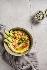 hummus with cucumber and sesame seeds