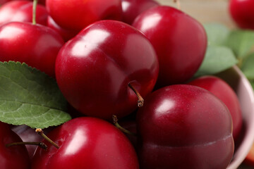 Fresh ripe cherry plums in bowl, closeup