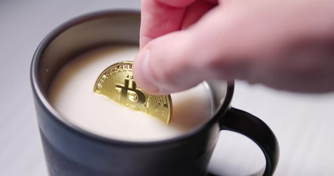 Buy the dip footage of dipping bitcoin into milk