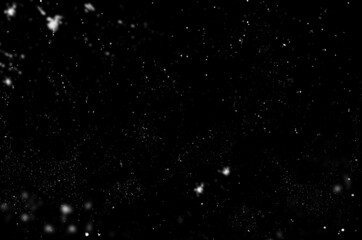 snow is flying in the air