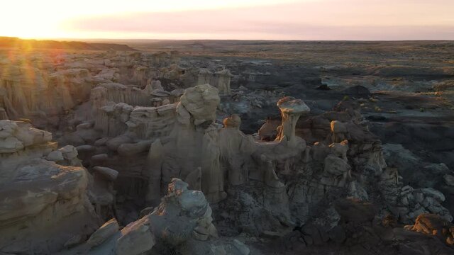 Cinematic aerial shot of Valley of Dreams in Bisti De Na Zin Wilderness in New Mexico