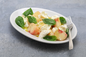 peach caprese salad; flat peach, mozzarella and basil