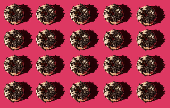Top view of a donuts on pink background