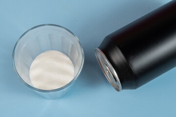 comparison of the amount of sugar in a can of soda .