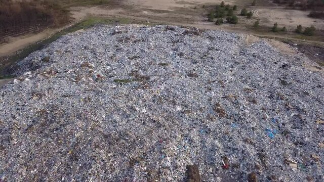 Aerial video of of large garbage pile. Ecological concept