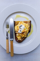 Scramble eggs on toasted whole grain bread.                                            