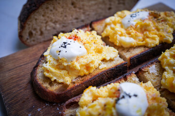 Scramble eggs on toasted whole grain bread.                                            
