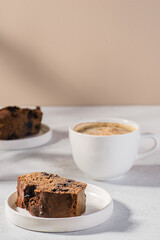 coffee in a mug with milk and cinnamon
