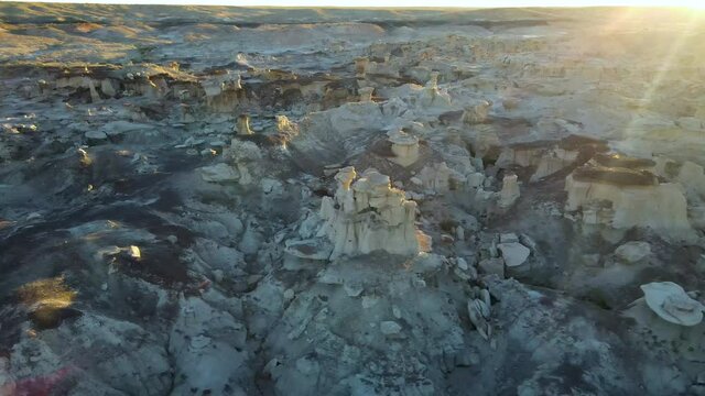 Cinematic aerial shot of Valley of Dreams in Bisti De Na Zin Wilderness in New Mexico
