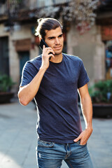 young top model man using smartphone