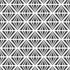 Abstract seamless pattern. Decorative geometric ornament of repeating triangles. Modern stylish texture. Vector black and white background.