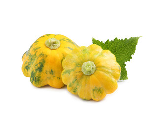 Fresh ripe pattypan squashes with leaf on white background