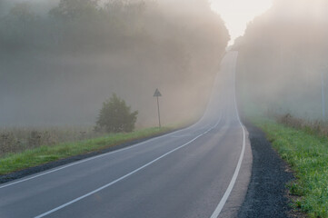 Beautiful landscape overlooking the road in fog