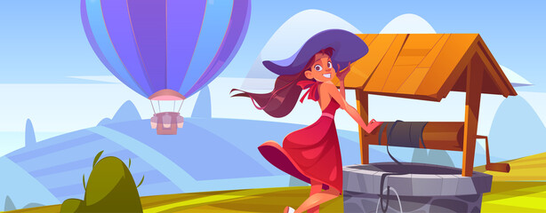 Summer landscape with fields, stone well, hot air balloon and beautiful girl in hat. Vector cartoon illustration of woman and old well with wooden roof and bucket in countryside © klyaksun