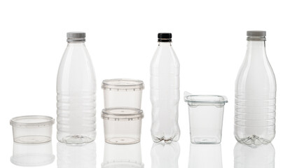 Silhouette of different types and sizes of empty transparent plastic bottles on white isolated background