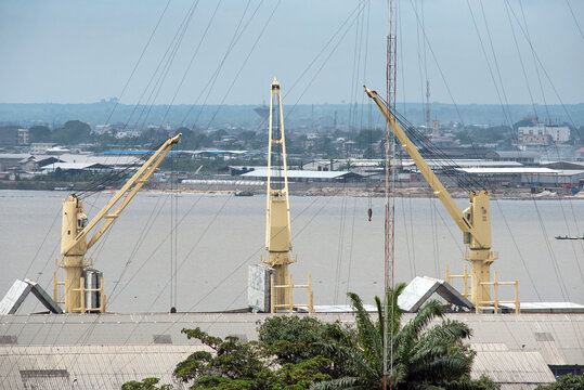  Three harbour cranes in Douala