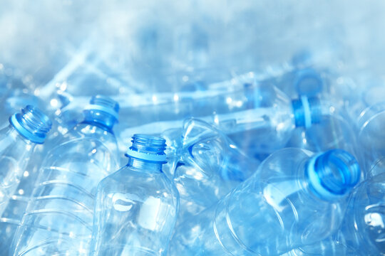 Used empty PET water bottles background, recycle and world environment day concept