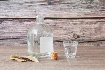 Bottle and glass with schnapps