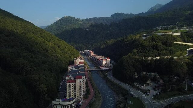 aerial view over the mountain river Mzymta at the ski resort Rosa Khutor (Sochi, Russia) on a sunny summer day