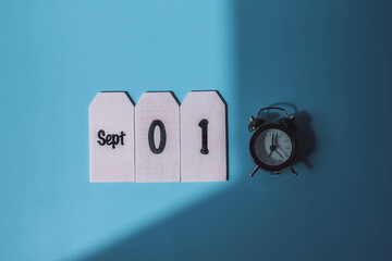 Back to school concept. September 1. Date of September month on blue background