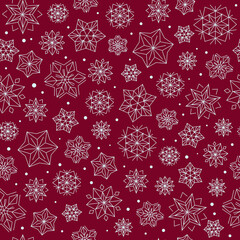 Seamless winter patterns on the theme of Christmas and New Year from multi-colored snowflakes.