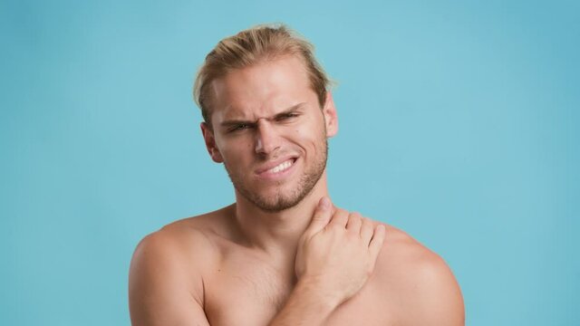 Ear Pain. Sick Young Man Suffering From Otitis Illness, Rubbing Sore Auricle