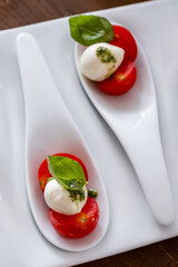 caprese salad mozzarella cheese, tomato basil leaf italian snack copy top view keto or paleo dietveggie vegetarian food